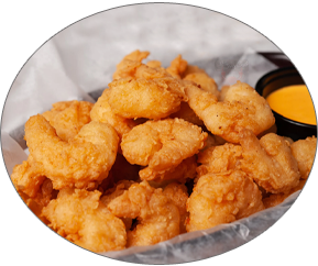 Popcorn Shrimp — Crunchy, breaded shrimp fried until golden.